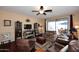Spacious living room with hardwood floors and comfortable furniture at 1780 W Morse Dr, Anthem, AZ 85086