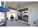 Covered patio with sliding glass doors and ceiling fan at 1780 W Morse Dr, Anthem, AZ 85086