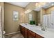 Double vanity bathroom with updated fixtures at 18456 E Superstition Dr, Queen Creek, AZ 85142