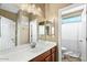 Bathroom with vanity, mirror and shower at 18456 E Superstition Dr, Queen Creek, AZ 85142