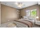 Bedroom with a queen bed and modern decor at 18456 E Superstition Dr, Queen Creek, AZ 85142