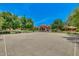 Outdoor community basketball court with lines and hoop at 18456 E Superstition Dr, Queen Creek, AZ 85142