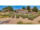 Cortina community entrance with landscaping and signage at 18456 E Superstition Dr, Queen Creek, AZ 85142