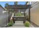 Relaxing hot tub with pergola cover at 18456 E Superstition Dr, Queen Creek, AZ 85142