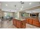 Large kitchen with an island, stainless steel appliances, and ample cabinetry at 18456 E Superstition Dr, Queen Creek, AZ 85142