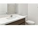 Bathroom features a vanity with a sink and toilet at 25380 W Sunland Ave, Buckeye, AZ 85326