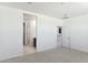 Bright bedroom with a view of the bathroom and hallway at 25380 W Sunland Ave, Buckeye, AZ 85326