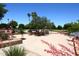 Landscaped courtyard with seating area and water feature at 2563 W Jacinto Cir, Mesa, AZ 85202