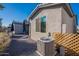 Backyard view of home's exterior and AC unit at 2743 N Lema Dr, Mesa, AZ 85215