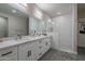 Elegant bathroom with double vanity and subway tile shower at 2743 N Lema Dr, Mesa, AZ 85215