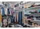 Large walk-in closet with ample shelving and hanging space at 2743 N Lema Dr, Mesa, AZ 85215