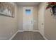 Bright entryway with gray wood-look tile floor and interior door at 2743 N Lema Dr, Mesa, AZ 85215