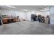 Unfinished garage with concrete floor, offering lots of storage options at 2743 N Lema Dr, Mesa, AZ 85215