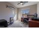 Home office with desk, chair, and large window at 2743 N Lema Dr, Mesa, AZ 85215
