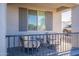 Covered patio with two chairs and a small table at 2743 N Lema Dr, Mesa, AZ 85215