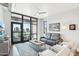 Spacious living room with floor to ceiling windows and city views at 310 S 4Th St # 1504, Phoenix, AZ 85004