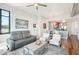 Living room with hardwood floors, comfortable seating and city views at 310 S 4Th St # 1504, Phoenix, AZ 85004