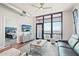 Living room with access to balcony and city views at 310 S 4Th St # 1504, Phoenix, AZ 85004