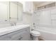 Clean bathroom with gray vanity, bathtub, and shower at 430 S 81St Pl, Mesa, AZ 85208