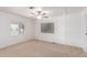 Spacious bedroom with ceiling fan and neutral carpeting at 430 S 81St Pl, Mesa, AZ 85208