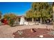 White single story home with mature trees and desert landscaping at 430 S 81St Pl, Mesa, AZ 85208