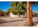 Single story home with carport and landscaped yard at 430 S 81St Pl, Mesa, AZ 85208