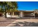 White single story home with carport and driveway at 430 S 81St Pl, Mesa, AZ 85208