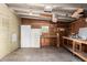 Spacious garage with workbench and ample storage at 430 S 81St Pl, Mesa, AZ 85208