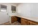 Laundry area with built-in cabinets and washer/dryer hookups at 430 S 81St Pl, Mesa, AZ 85208