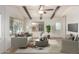 Living room with neutral decor and wood beams at 430 S 81St Pl, Mesa, AZ 85208