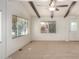 Bright living room with large windows and carpet at 430 S 81St Pl, Mesa, AZ 85208