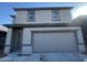 Two-story house with attached garage, under construction at 47651 W Cansados Rd, Maricopa, AZ 85139