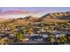 Aerial view of home and neighborhood with mountain backdrop at 9413 N 34Th Pl, Phoenix, AZ 85028