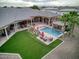 Luxury estate home with a large backyard, pool, and expansive lawn at 9968 W Jj Ranch Rd, Peoria, AZ 85383