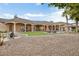 Expansive backyard oasis with putting green and sparkling pool at 9968 W Jj Ranch Rd, Peoria, AZ 85383