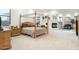 Spacious Primary bedroom featuring a king-size bed and fireplace at 9968 W Jj Ranch Rd, Peoria, AZ 85383