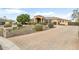 Beautiful home exterior with a grand entrance and manicured landscaping at 9968 W Jj Ranch Rd, Peoria, AZ 85383