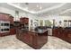 Spacious kitchen with large island and top-of-the-line appliances at 9968 W Jj Ranch Rd, Peoria, AZ 85383