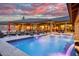 Luxury pool and spa with spacious patio and seating area at 9968 W Jj Ranch Rd, Peoria, AZ 85383