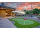 Private putting green in expansive backyard at 9968 W Jj Ranch Rd, Peoria, AZ 85383