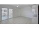 Dining area boasts tile flooring and sliding glass doors to a screened outdoor space at 10533 W Wheatridge Dr, Sun City, AZ 85373