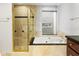 Bathroom with a large bathtub, shower, and granite vanity at 10796 N 78Th St, Scottsdale, AZ 85260