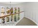 Elegant hallway with bay window and chandelier at 10796 N 78Th St, Scottsdale, AZ 85260