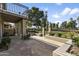 Private patio with stone pavers, landscaping, and golf course views at 10796 N 78Th St, Scottsdale, AZ 85260
