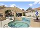 Community spa with lounge chairs and modern art features at 10796 N 78Th St, Scottsdale, AZ 85260