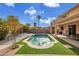 Private backyard with a beautiful pool and patio at 13616 W San Miguel Ave, Litchfield Park, AZ 85340