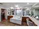 Large bathroom with double sinks, soaking tub and walk-in closet at 13616 W San Miguel Ave, Litchfield Park, AZ 85340