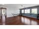 Spacious bonus room with hardwood floors, hammock, and punching bag at 13616 W San Miguel Ave, Litchfield Park, AZ 85340
