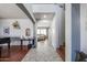 Bright and spacious entryway with hardwood floors and staircase at 13616 W San Miguel Ave, Litchfield Park, AZ 85340