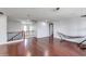 Upstairs hallway with wood flooring and a view of the staircase at 13616 W San Miguel Ave, Litchfield Park, AZ 85340